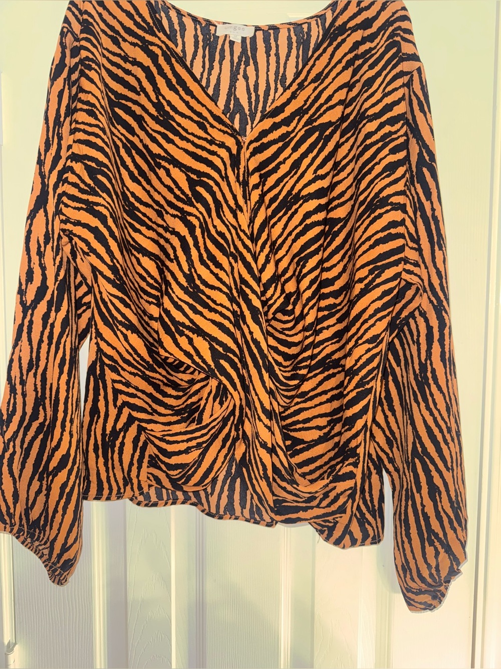 Umgee Orange and Black Zebra-Print V-Neck Blouse